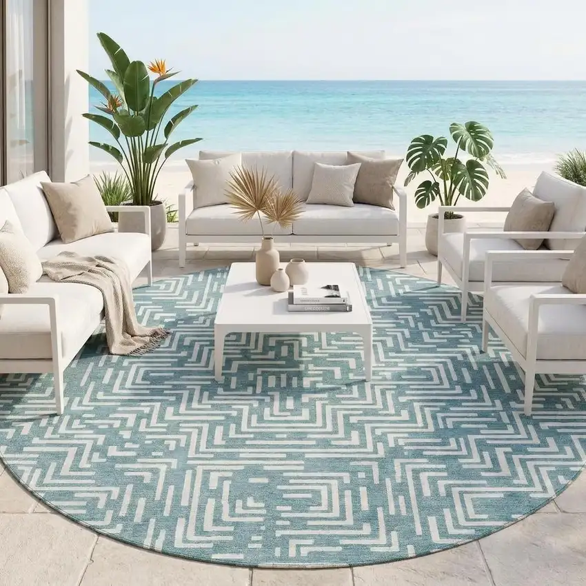 8' Teal Blue And Ivory Round Geometric Washable Indoor Outdoor Area Rug Photo 1