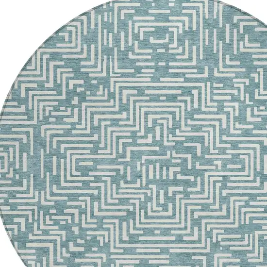 8' Teal Blue And Ivory Round Geometric Washable Indoor Outdoor Area Rug Photo 4