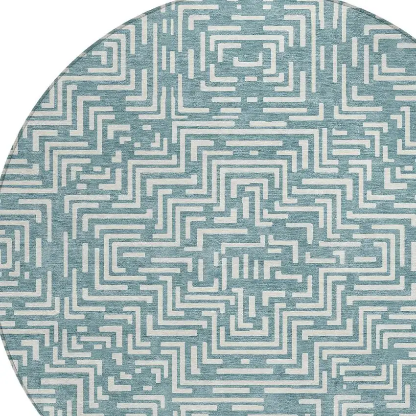 8' Teal Blue And Ivory Round Geometric Washable Indoor Outdoor Area Rug Photo 4