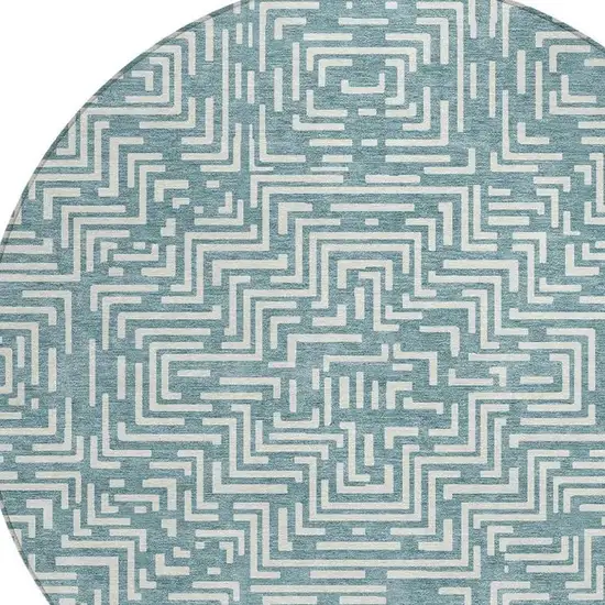 8' Teal Blue And Ivory Round Geometric Washable Indoor Outdoor Area Rug Photo 3