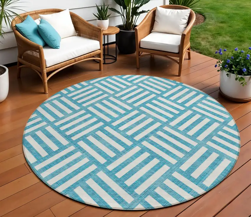 8' Teal Blue And Ivory Round Geometric Washable Indoor Outdoor Area Rug Photo 1