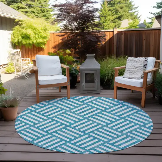 8' Teal Blue And Ivory Round Geometric Washable Indoor Outdoor Area Rug Photo 7