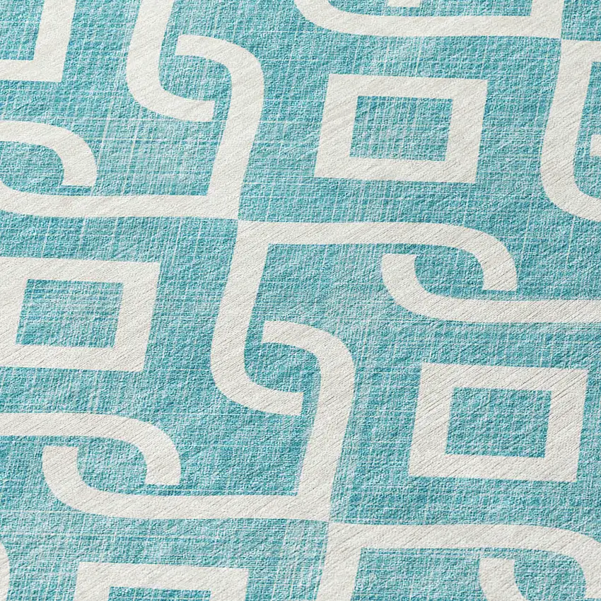 8' Teal Blue And Ivory Round Geometric Washable Indoor Outdoor Area Rug Photo 7