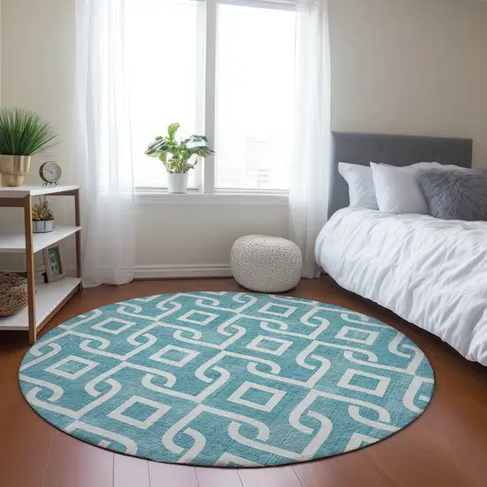 8' Teal Blue And Ivory Round Geometric Washable Indoor Outdoor Area Rug Photo 6