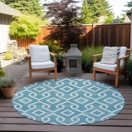 8' Teal Blue And Ivory Round Geometric Washable Indoor Outdoor Area Rug Photo 5