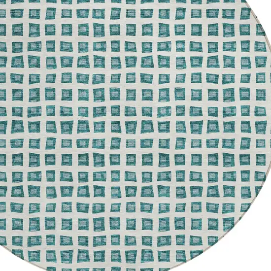 8' Teal Blue And Ivory Round Geometric Washable Indoor Outdoor Area Rug Photo 6