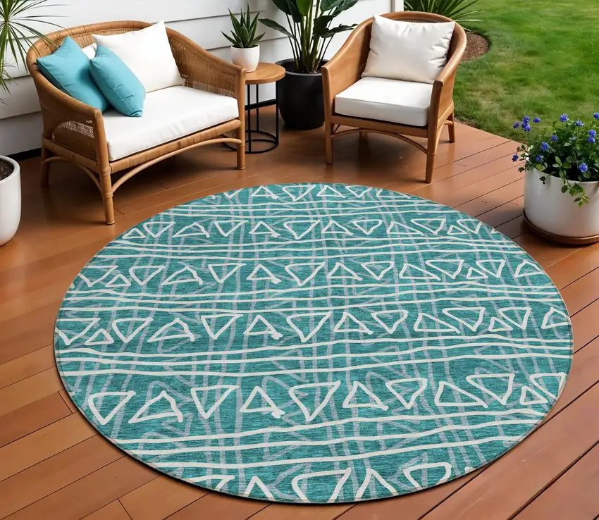8' Teal Blue And Ivory Round Geometric Washable Indoor Outdoor Area Rug Photo 1