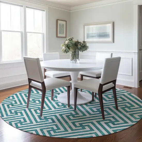 8' Teal Blue And Ivory Round Geometric Washable Indoor Outdoor Area Rug Photo 8