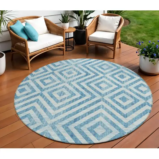 8' Teal Blue And Ivory Round Geometric Washable Indoor Outdoor Area Rug Photo 1