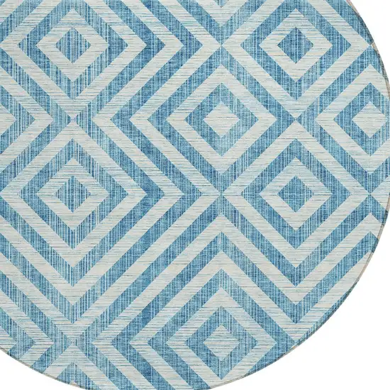 8' Teal Blue And Ivory Round Geometric Washable Indoor Outdoor Area Rug Photo 5