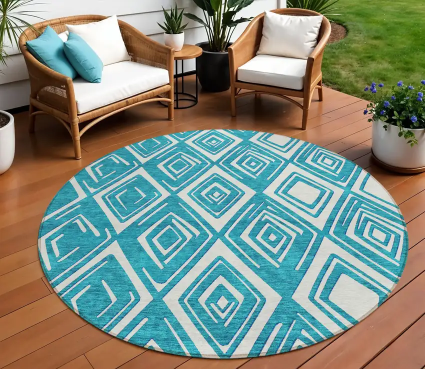 8' Teal Blue And Ivory Round Geometric Washable Indoor Outdoor Area Rug Photo 1