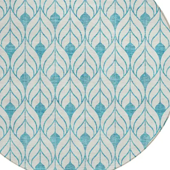 8' Teal Blue And Ivory Round Geometric Washable Indoor Outdoor Area Rug Photo 4