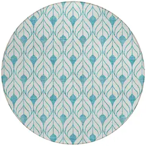 Photo of 8' Teal Blue And Ivory Round Geometric Washable Indoor Outdoor Area Rug