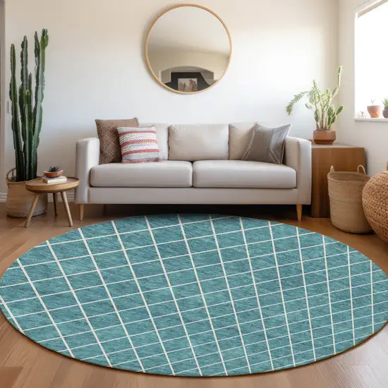 8' Teal Blue And Ivory Round Geometric Washable Indoor Outdoor Area Rug Photo 7