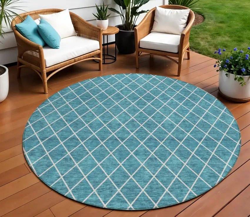 8' Teal Blue And Ivory Round Geometric Washable Indoor Outdoor Area Rug Photo 1
