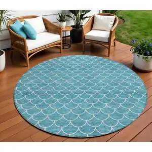 Photo of 8' Teal Blue And Ivory Round Geometric Washable Indoor Outdoor Area Rug