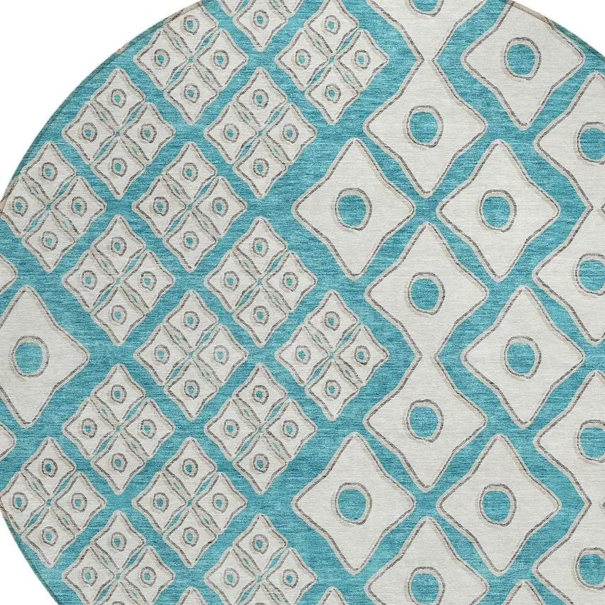8' Teal Blue And Ivory Round Geometric Washable Indoor Outdoor Area Rug Photo 4