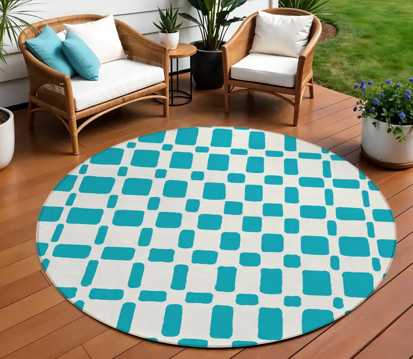 8' Teal Blue And Ivory Round Geometric Washable Indoor Outdoor Area Rug Photo 1