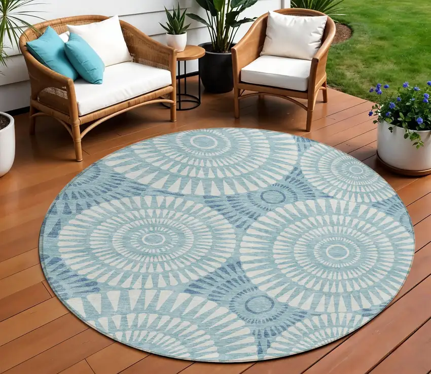8' Teal Blue And Ivory Round Geometric Washable Indoor Outdoor Area Rug Photo 1