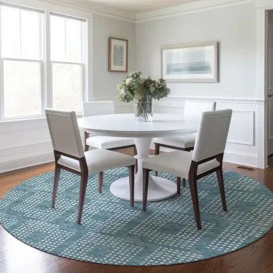 8' Teal Blue And Ivory Round Geometric Washable Indoor Outdoor Area Rug Photo 7