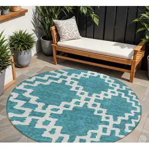 Photo of 8' Teal Blue And Ivory Round Geometric Washable Indoor Outdoor Area Rug