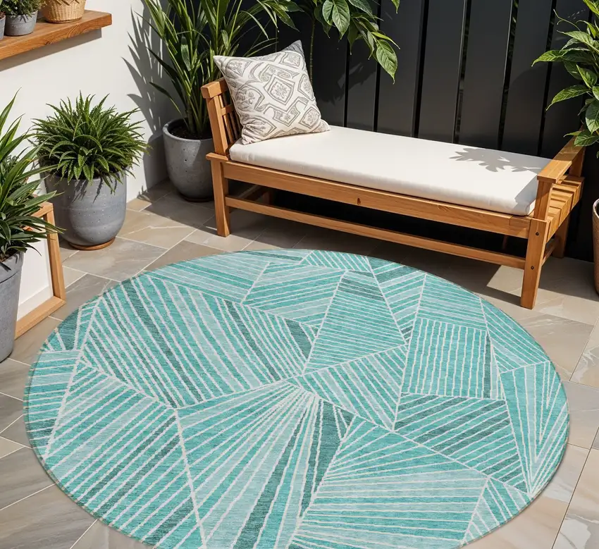 8' Teal Blue And Ivory Round Geometric Washable Indoor Outdoor Area Rug Photo 1