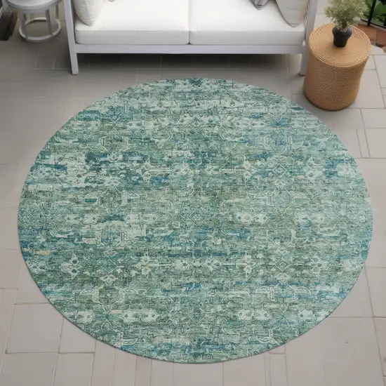 8' Teal Blue And Ivory Round Ikat Washable Indoor Outdoor Area Rug Photo 8