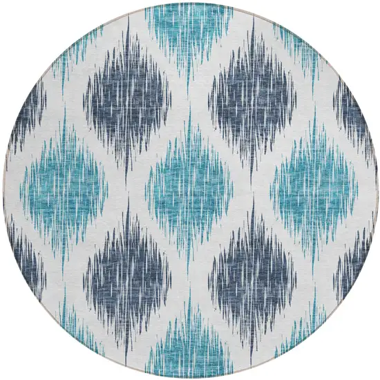 8' Teal Blue And Ivory Round Ikat Washable Indoor Outdoor Area Rug Photo 1