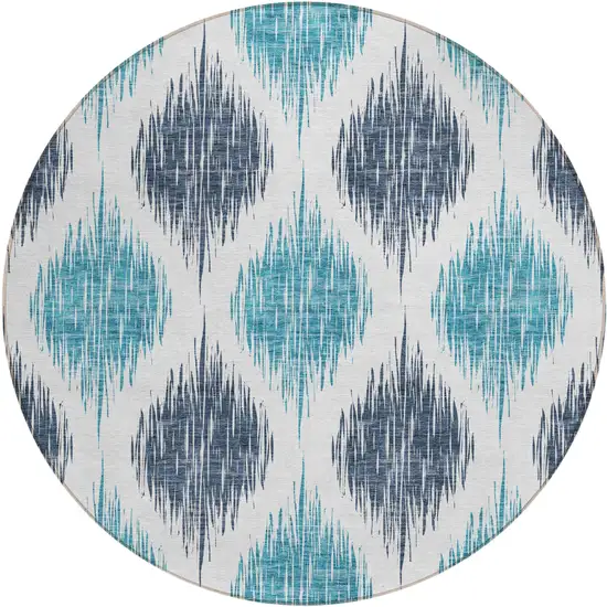 8' Teal Blue And Ivory Round Ikat Washable Indoor Outdoor Area Rug Photo 1