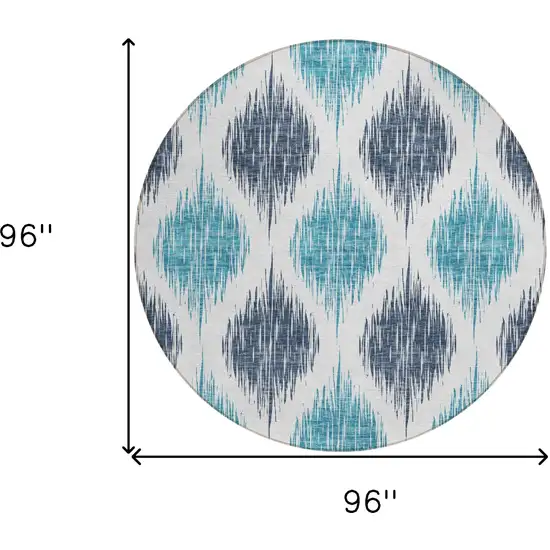8' Teal Blue And Ivory Round Ikat Washable Indoor Outdoor Area Rug Photo 6