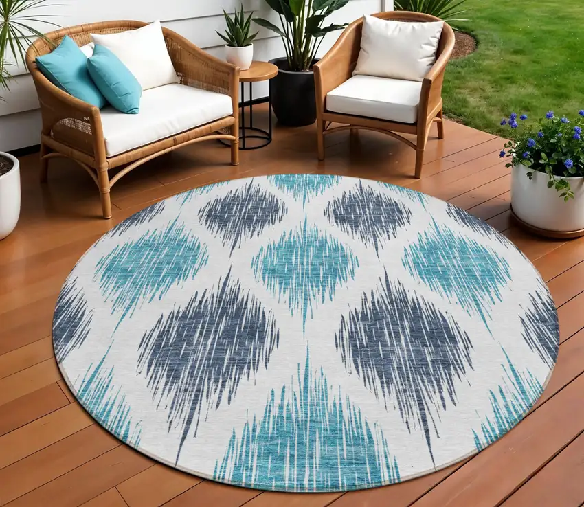 8' Teal Blue And Ivory Round Ikat Washable Indoor Outdoor Area Rug Photo 8