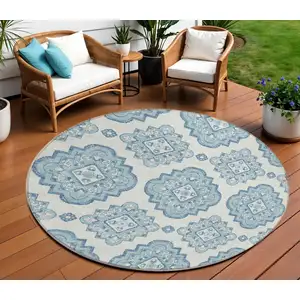 Photo of 8' Teal Blue And Ivory Round Medallion Washable Indoor Outdoor Area Rug