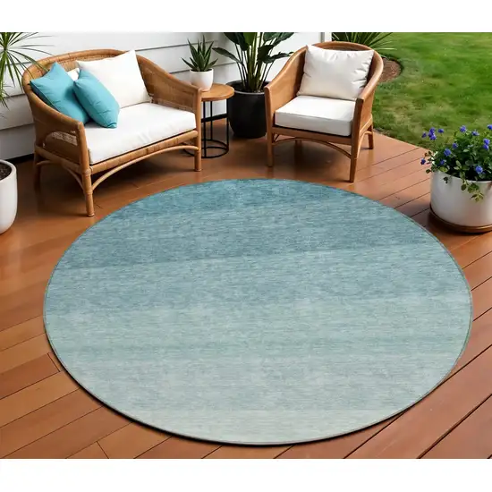 8' Teal Blue And Ivory Round Ombre Washable Indoor Outdoor Area Rug Photo 1