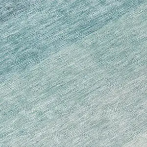 Photo of 8' Teal Blue And Ivory Round Ombre Washable Indoor Outdoor Area Rug