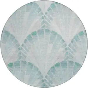 Photo of 8' Teal Blue And Ivory Round Seashell Washable Indoor Outdoor Area Rug