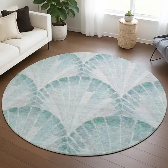 8' Teal Blue And Ivory Round Seashell Washable Indoor Outdoor Area Rug Photo 5