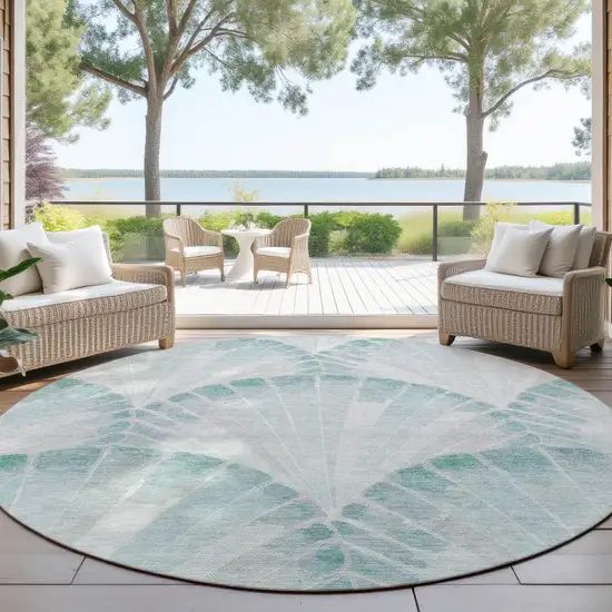 8' Teal Blue And Ivory Round Seashell Washable Indoor Outdoor Area Rug Photo 4