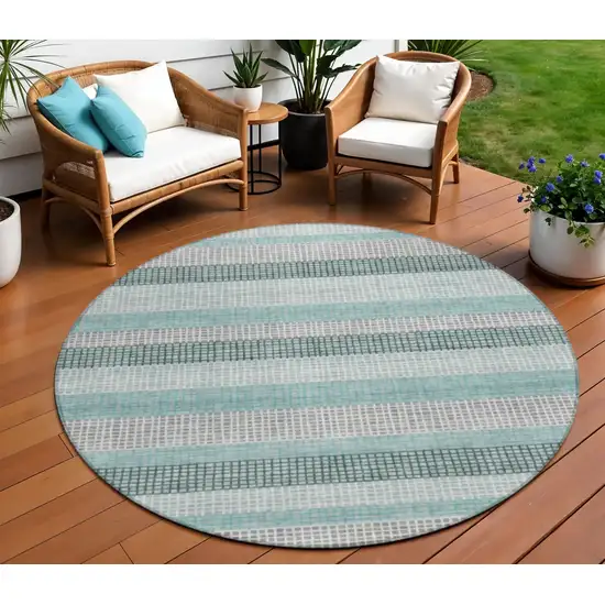 8' Teal Blue And Ivory Round Striped Washable Indoor Outdoor Area Rug Photo 2