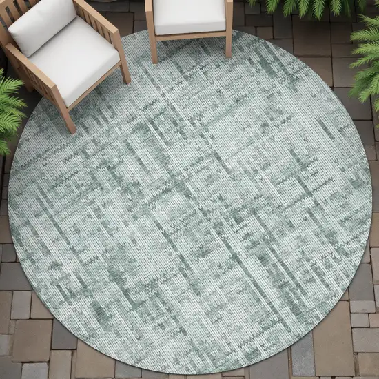 8' Teal Blue And Ivory Round Striped Washable Indoor Outdoor Area Rug Photo 5