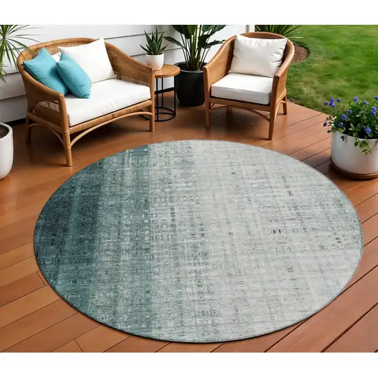 8' Teal Blue And Ivory Round Striped Washable Indoor Outdoor Area Rug Photo 1