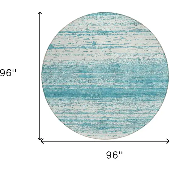 8' Teal Blue And Ivory Round Striped Washable Indoor Outdoor Area Rug Photo 3
