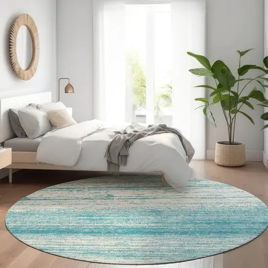 8' Teal Blue And Ivory Round Striped Washable Indoor Outdoor Area Rug Photo 7