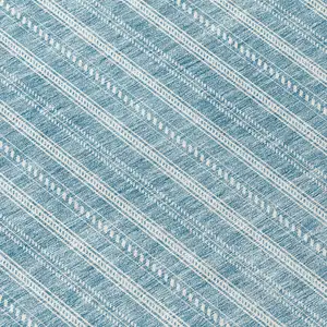 Photo of 8' Teal Blue And Ivory Round Striped Washable Indoor Outdoor Area Rug