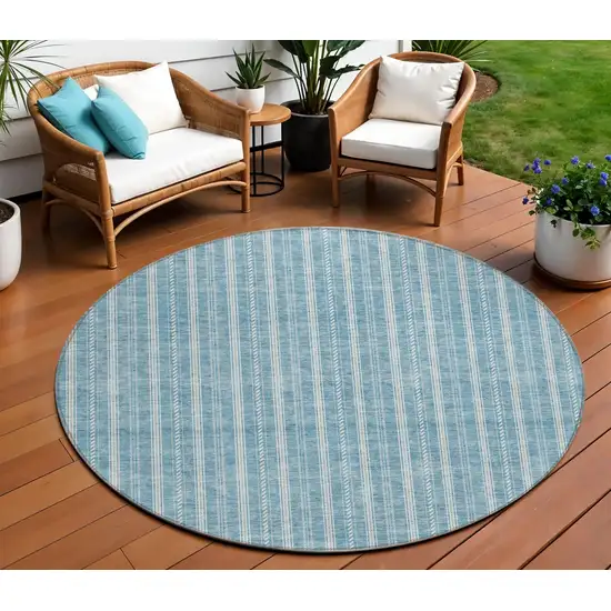 8' Teal Blue And Ivory Round Striped Washable Indoor Outdoor Area Rug Photo 1