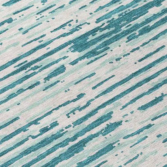 8' Teal Blue And Ivory Round Striped Washable Indoor Outdoor Area Rug Photo 8