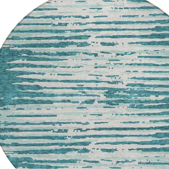 8' Teal Blue And Ivory Round Striped Washable Indoor Outdoor Area Rug Photo 4