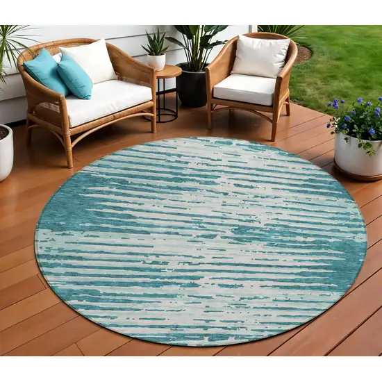 8' Teal Blue And Ivory Round Striped Washable Indoor Outdoor Area Rug Photo 1