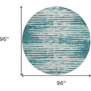 Photo of 8' Teal Blue And Ivory Round Striped Washable Indoor Outdoor Area Rug