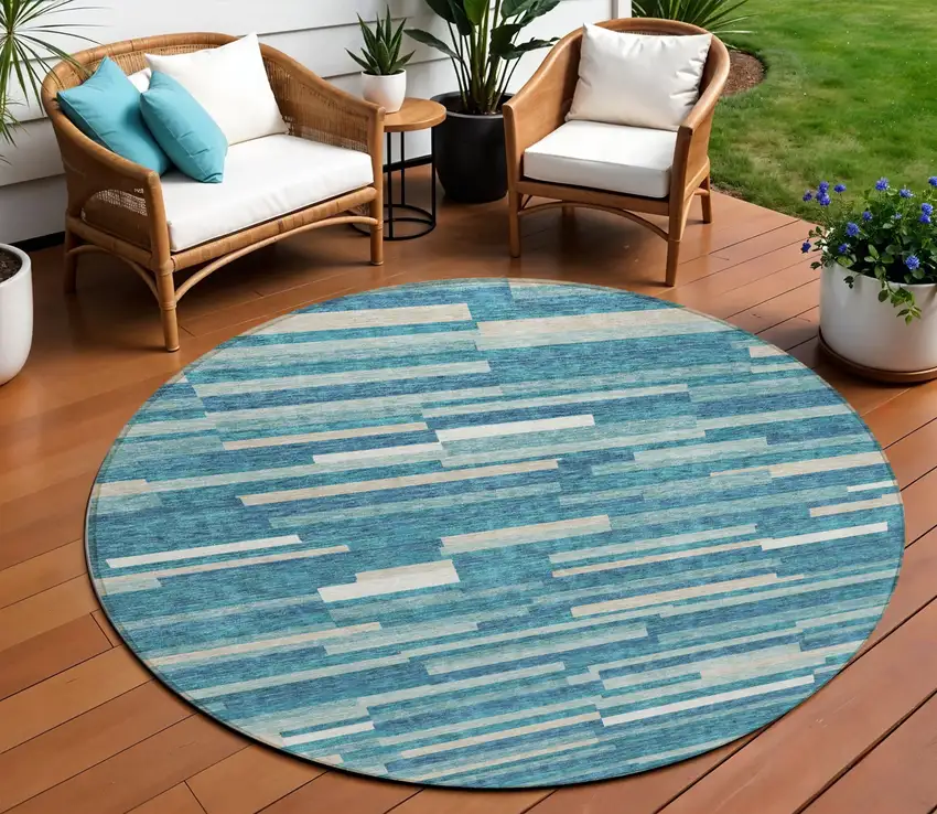 8' Teal Blue And Ivory Round Striped Washable Indoor Outdoor Area Rug Photo 1