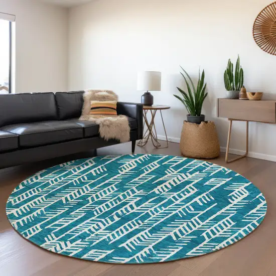 8' Teal Blue And Ivory Round Tribal Washable Indoor Outdoor Area Rug Photo 6